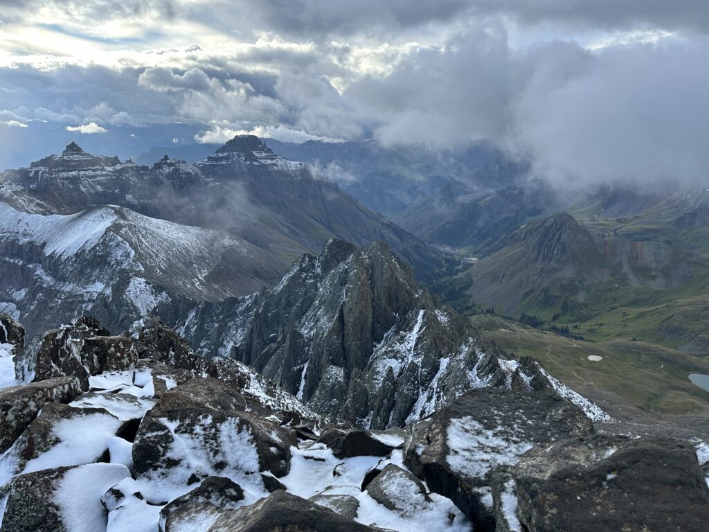 The top of Mount Sneffels with views of jagged peaks